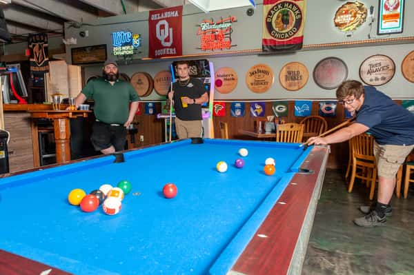 people playing pool