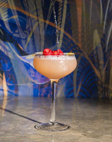 Botanist Gin + Lemon Juice + Raspberry Jam + Honey Syrup Topped w/Champagne