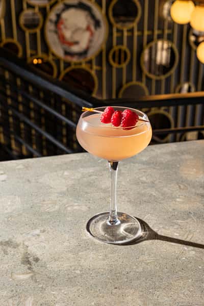 Botanist Gin + Lemon Juice + Raspberry Jam + Honey Syrup Topped w/Champagne
