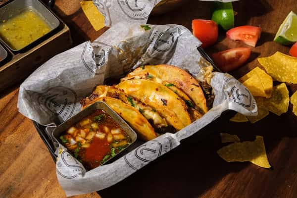 Quesa birria tacos