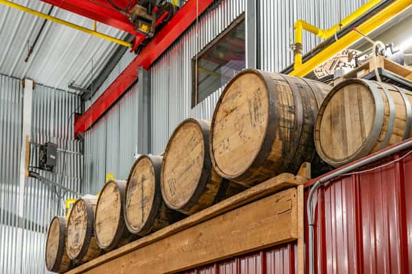 Kegs stacked on a shelft inside the brewery
