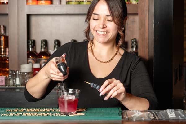 Bartender creating a cocktail