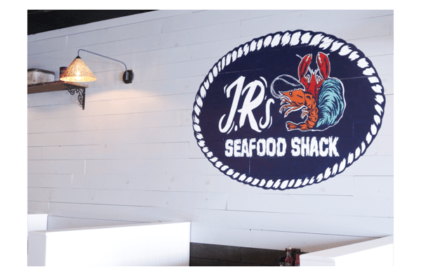 JRs Sign on Wall