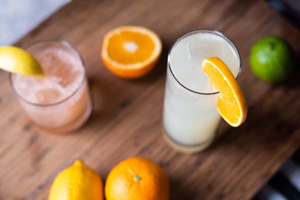 Drinks and cocktails with fresh oranges and limes