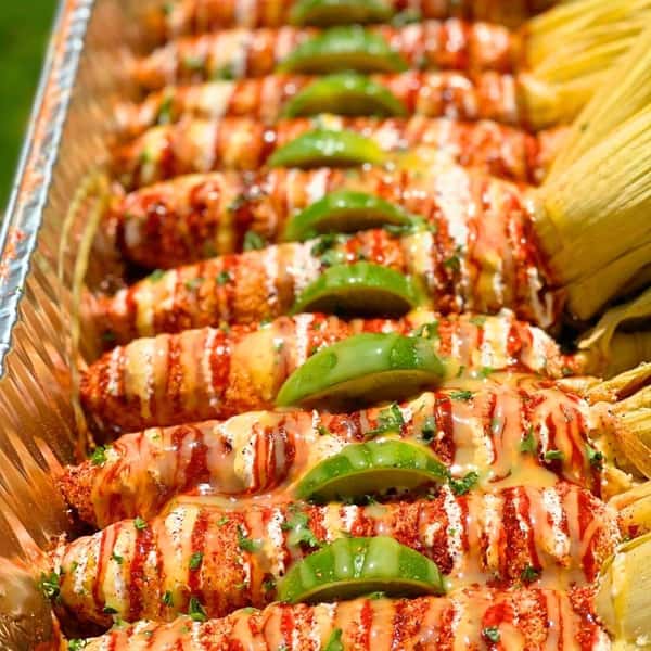 Aww Shucks Mexican Street Corn is a fan favorite for a reason 🌽 Fire-roasted corn layered with Cotija-style cheese, chili lime seasoning, dry Tajín, tangy chili lime sauce, and movie butter brings bold flavor in every bite. 🔥 #AwwShucks #MexicanStreetCorn #Elote #Foodie