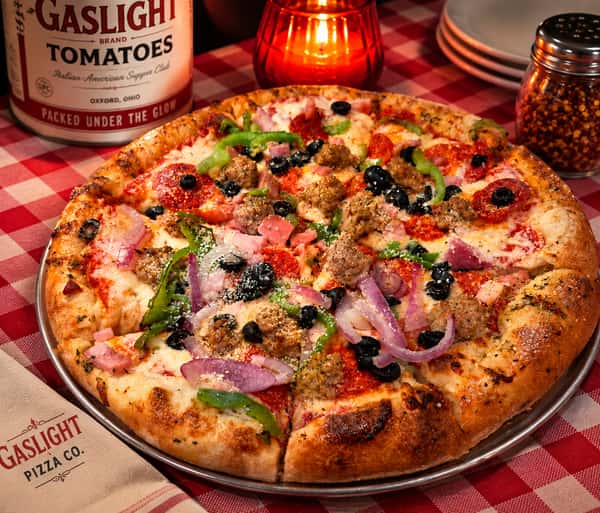 The ultimate combination pizza. Pepperoni, Italian Sausage, Ham, black olives, green pepper and red onion