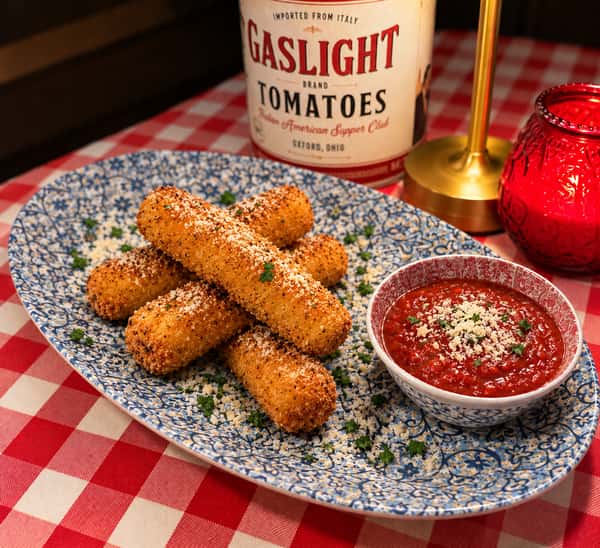 Seasoned and breaded mozzarella sticks served with our very tasty Brew Homemade pizza sauce.