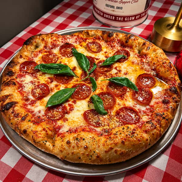 This one has all the pepperoni on it! Original, cup & crisp and diced pepperoni with lots of cheese and a little fresh basil for added color.