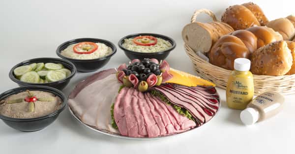 deli platter with spreads and breads