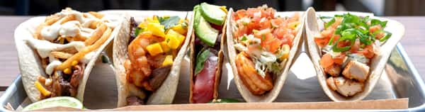 Five different styles of tacos