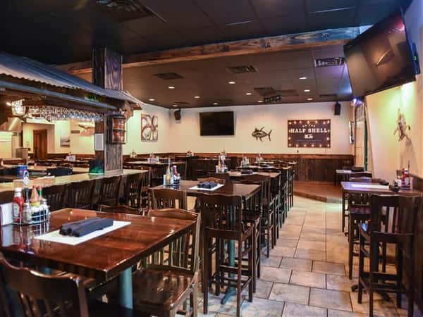 dining room with tables set up and the bar on the left