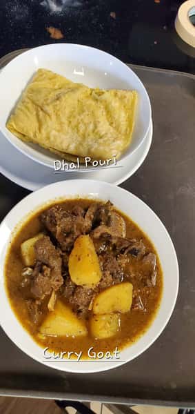 Curry Goat w/ Dhal Pourl