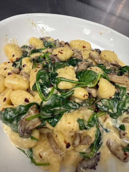 Gnocchi with mushrooms and spinach