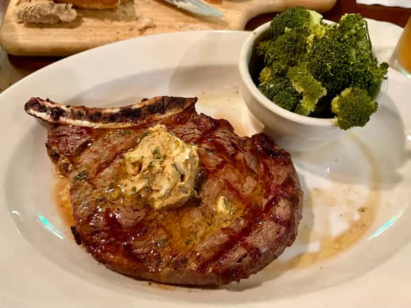 Steak with butter and broccoli side dish