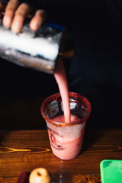 pouring cocktail