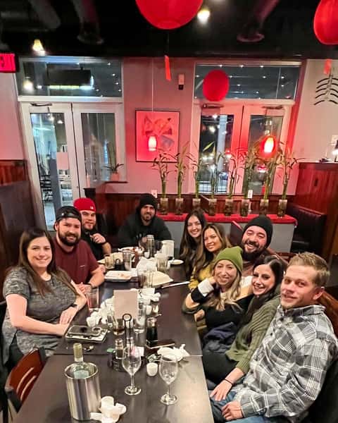 Happy customers celebrating at the restaurant