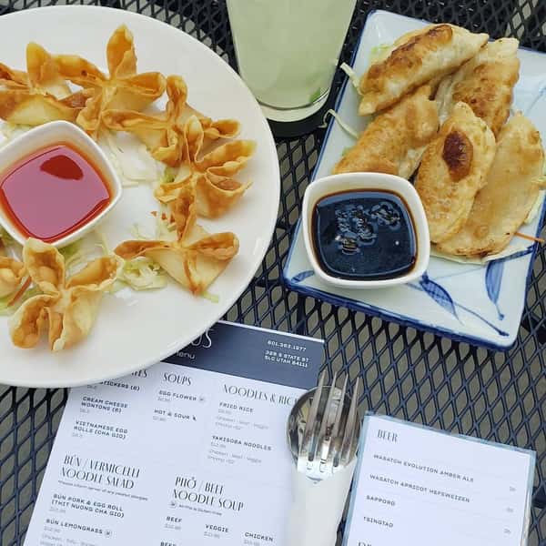Appetizers and menu on table outside
