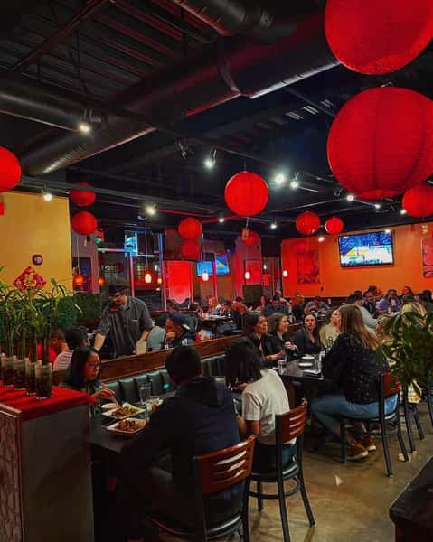 Interior of the restaurant, filled with hungry customers