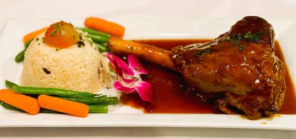 Jarret d'Agneau aux Petits Légumes et Couscous (Braised Lamb Shank with Vegetables and Couscous)