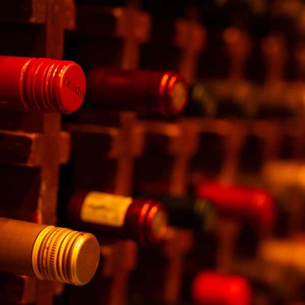 Wine bottles on a rack