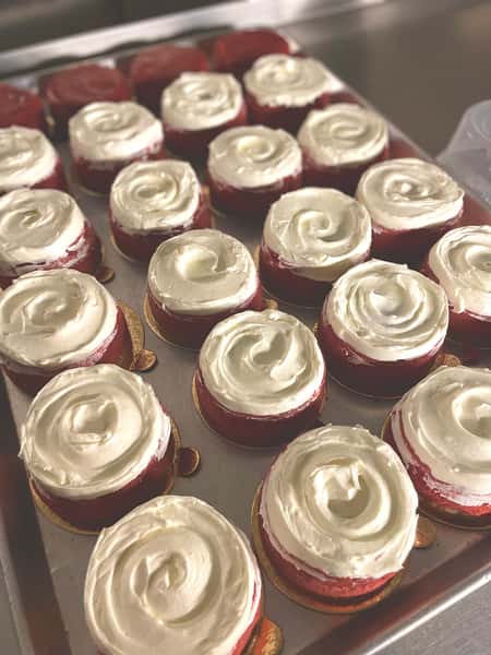 a pan of red velvet cheesecakes