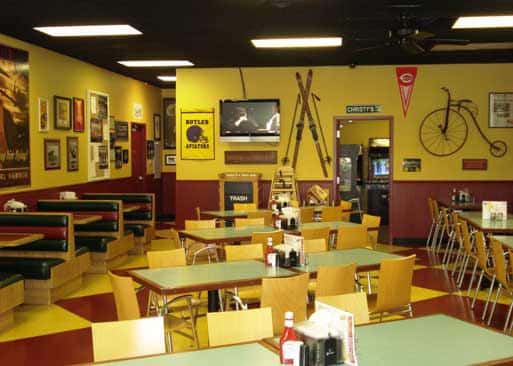 Interior of building. empty tables with tile patterned floor