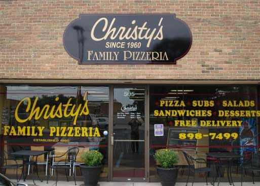 Brick exterior of building with sign labled Christy's Since 1080 Family Pizzeria