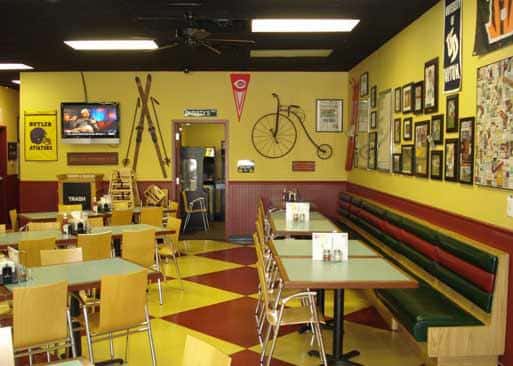 Interior of buidling. empty tables with tile patterned floor