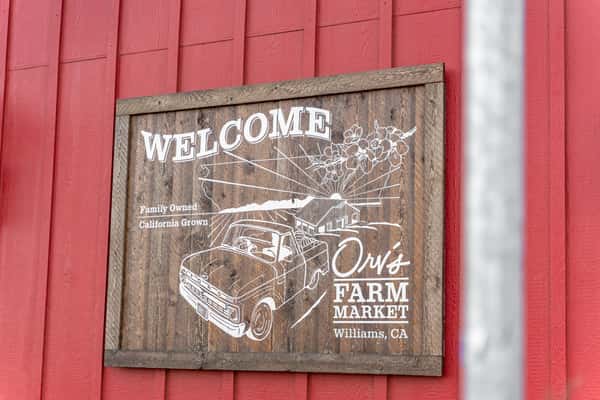 Welcome to Orv's Farm Market wooden sign