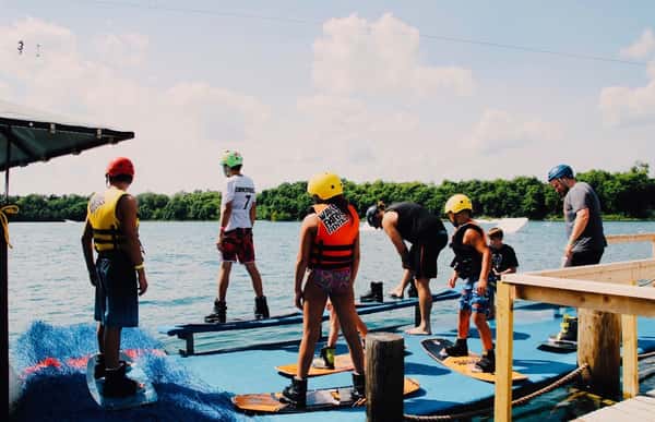 People wake boarding