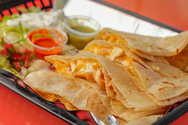 Large Quesadilla with meat at Señor Burrito Company