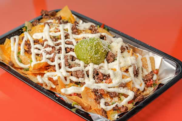 Carne Asada Nachos in a plate at Señor Burrito Company