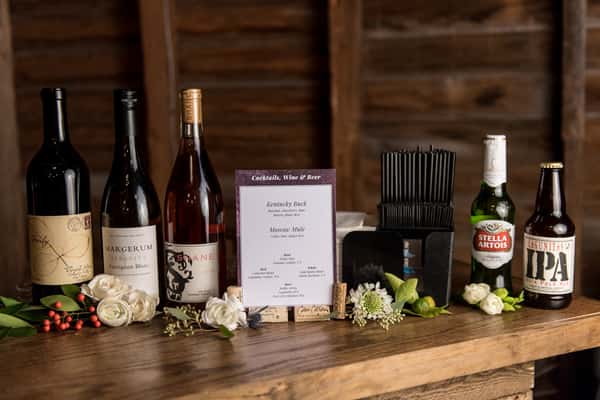 A picture of wine bottles at a wedding