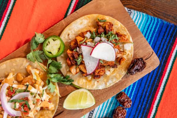 Guess what's getting all the foodie love at Cencalli Taqueria? It's our delectable Chicken al Pastor single taco! 🌮🔥 Bursting with flavors of diced dark chicken al pastor, topped with onion, cilantro, and radish - it's a treat for your taste buds. And don't forget our homemade salsa on the side that brings it all together! 😋 Come and see why this dish is creating waves! #TacoLove #CencalliCravings