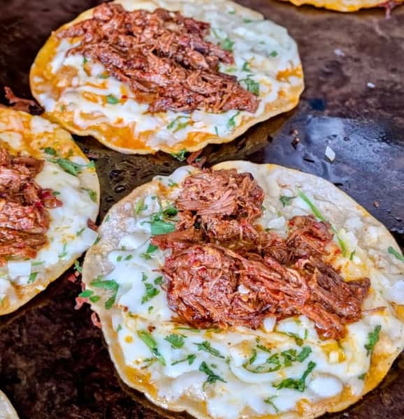 Have you tried our delicious Quesabirria tacos?  Three quesabirria tacos with melted bacio cheese, cilantro and onions. Served with a side of beef consome' for dipping. 🌮🤤🥳
.
.
.
.
#birria #tacos #littletoncolorado #quesabirria #denverfoodie