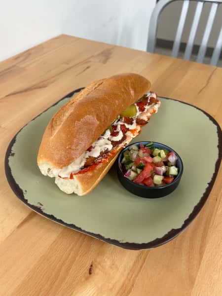 Matbucha Schnitzel Sandwich on Baguette