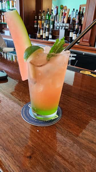 Cocktail with melon, lime and cucumber