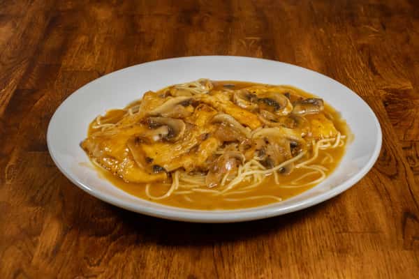 Chicken Marsala served on a bed of angel hair pasta with sautéed mushrooms and a rich Marsala wine and butter sauce.