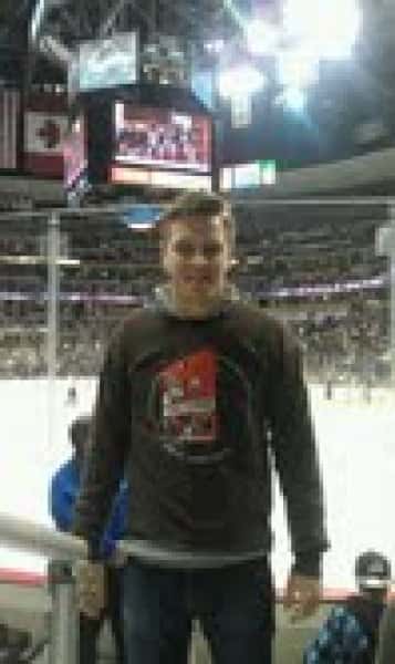 Dustin in a Red Pepper shirt in the Pepsi Center for an Avs game.