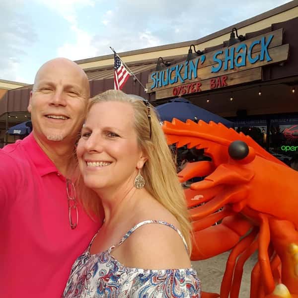 Customers taking a selfie with the statue