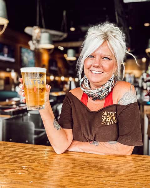 Bartender serving up a cold one