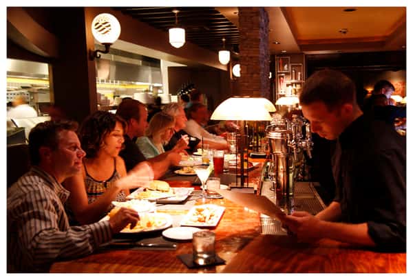 diners eating at bar
