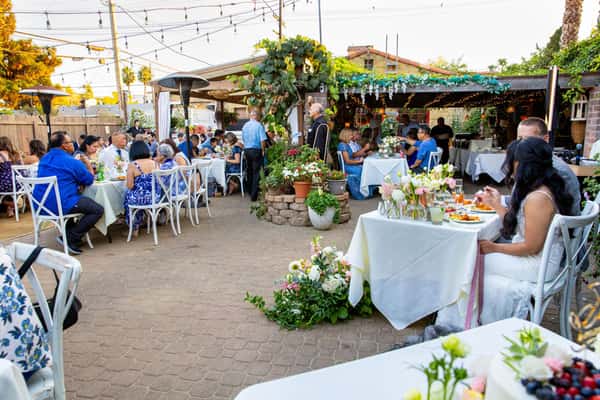 Dinner outside at wedding reception; photo credit Karen D Photography