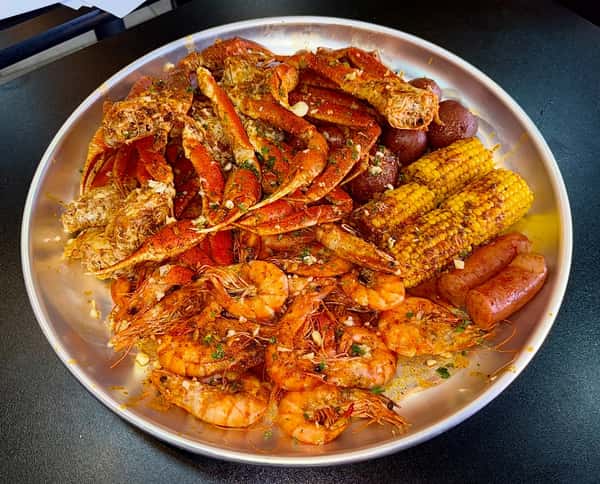 3 lb snow crab, 1 lb shrimp, 4 corn, 4 potato, 2 sausage