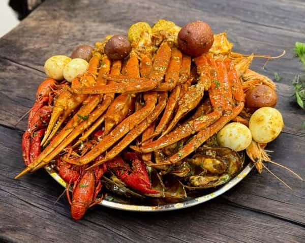 2 lb snow crab, 1 lb shrimp, 1 lb crawfish, 1 lb mussel, 4 corn, 4 potato, 4 egg