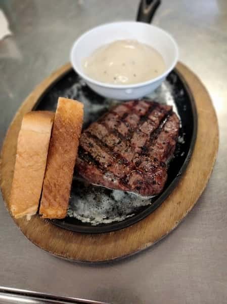 steak with potatoes and Texas toast