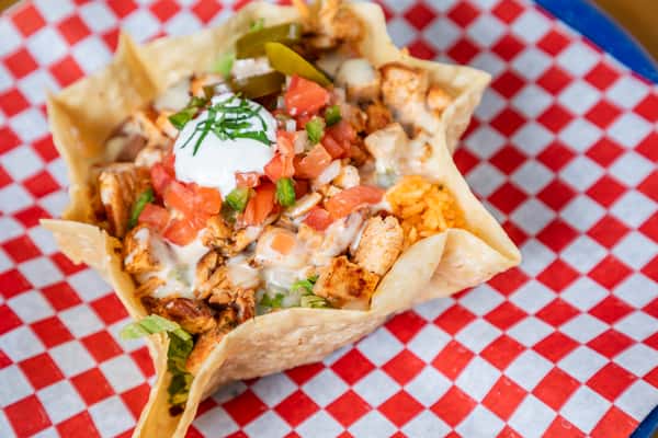 Taco salad on takeout paper