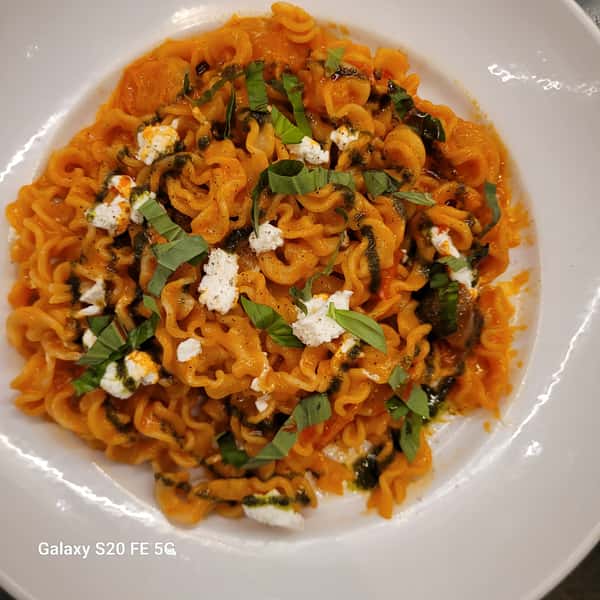 - House-made Malfadine Pasta