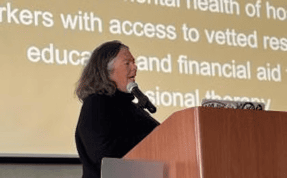 Person speaking at an event