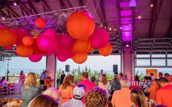 Attendees at the 2nd annual Orange Party